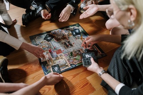 People playing a board game