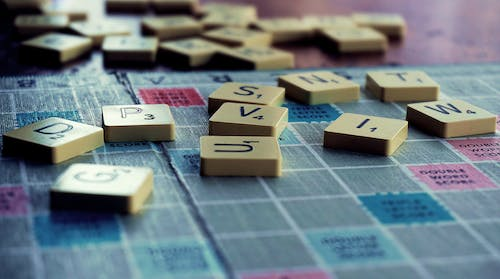 Scrabble pieces on a board
