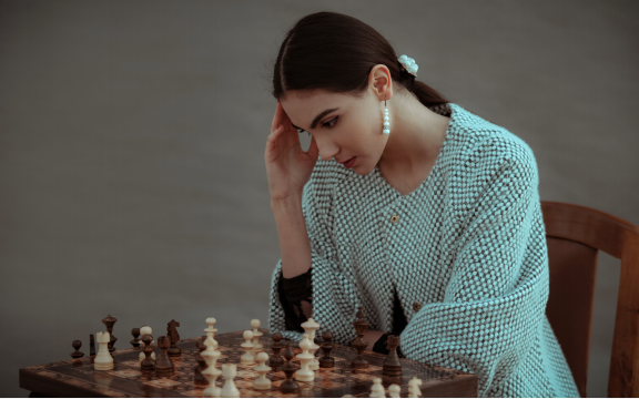 woman playing chess